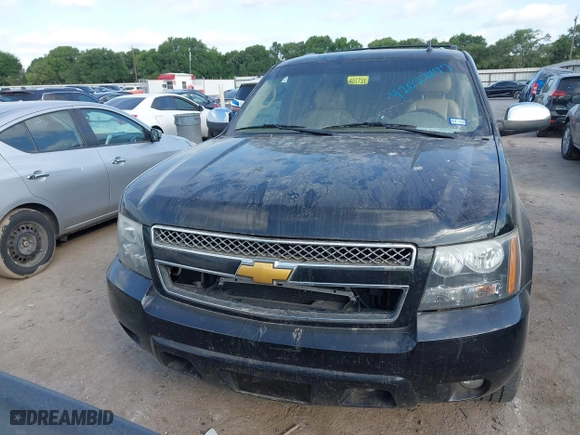2014 Chevrolet Suburban LTZ with VIN 1GNSCKE08ER220808, listed as a IAAI auction lot 42022477 with 192,488 mi miles. Bid and sale history available at carsss.com. Image 12.