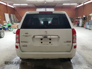 2012 Suzuki Grand Vitara Premium z VIN JS3TD0D66C4100845, wystawiony jako Copart lot #53454565 z przebiegiem 106 415 mil mil oraz Szkoda całkowita • Salvage title. Historia ofert i sprzedaży dostępna na DreamBid. Obrazek 6.