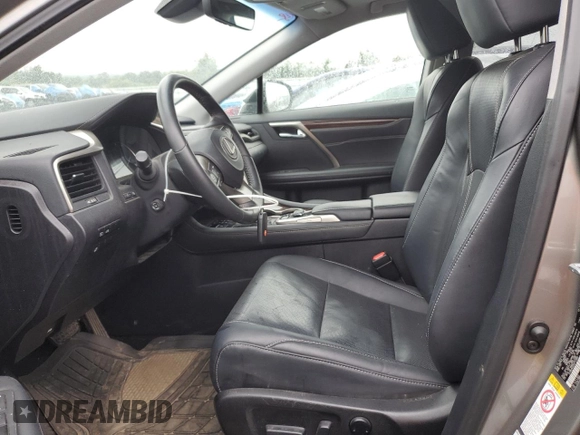 2017 Lexus RX 350 z VIN 2T2BZMCAXHC112957, wystawiony jako Copart lot #60876885 z przebiegiem 66 534 mil mil oraz Szkoda całkowita • Salvage title. Historia ofert i sprzedaży dostępna na DreamBid. Obrazek 7.