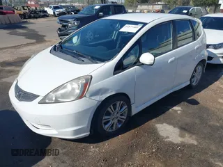 2009 Honda Fit Sport w/Navi with VIN JHMGE88679S067041, listed as a IAAI auction lot 41877402 with 162,485 mi miles. Bid and sale history available at carsss.com. Image 2.