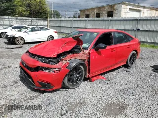 2022 Honda Civic Sport z VIN 2HGFE2F56NH512411, wystawiony jako Copart lot #55897305 z przebiegiem Nie podano mil oraz Szkoda całkowita • Salvage title. Historia ofert i sprzedaży dostępna na DreamBid. Obrazek 1.