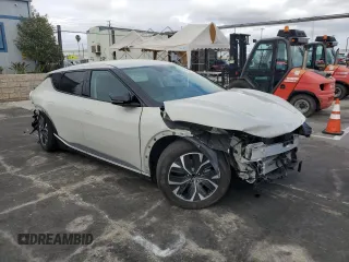 2024 Kia EV6 Wind with VIN KNDC34LA6R5224440, listed as a Copart auction lot 49402935 with 5,449 mi miles and Salvage Title. Bid and sale history available at carsss.com. Image 4.