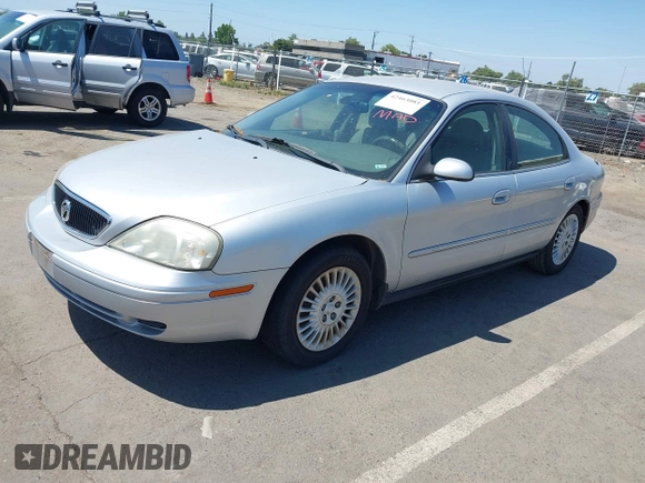 2002 Mercury Sable GS z VIN 1MEFM50U72A624825, wystawiony jako IAAI lot #42463081 z przebiegiem 88 873 mil mil oraz . Historia ofert i sprzedaży dostępna na DreamBid. Obrazek 2.