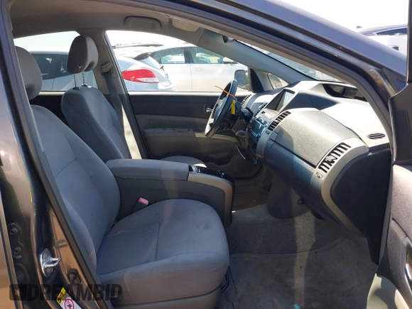 2008 Toyota Prius z VIN JTDKB20U883384556, wystawiony jako IAAI lot #42236131 z przebiegiem 71 463 mil mil oraz . Historia ofert i sprzedaży dostępna na DreamBid. Obrazek 5.