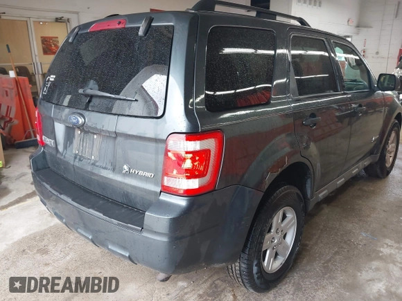 2009 Ford Escape Hybrid with VIN 1FMCU49339KB19700, listed as a IAAI auction lot 42253749 with 169,299 mi miles and . Bid and sale history available at DreamBid. Image 4.