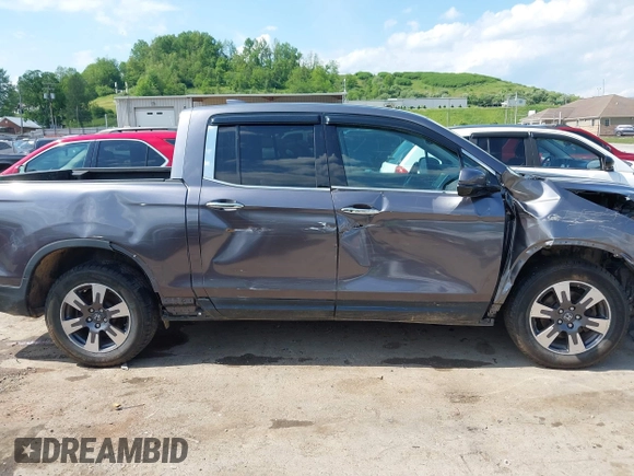 2018 Honda Ridgeline RTL-E with VIN 5FPYK3F74JB004162, listed as a IAAI auction lot 42180687 with 160,805 mi miles and . Bid and sale history available at DreamBid. Image 14.