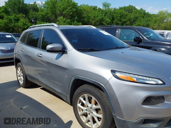 2014 Jeep Cherokee Latitude with VIN 1C4PJMCB4EW315520, listed as a IAAI auction lot 42034989 with 215,758 mi miles and . Bid and sale history available at DreamBid. Image 13.