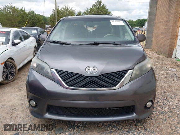 2012 Toyota Sienna SE with VIN 5TDXK3DC2CS235211, listed as a IAAI auction lot 42390354 with 242,602 mi miles and . Bid and sale history available at DreamBid. Image 13.