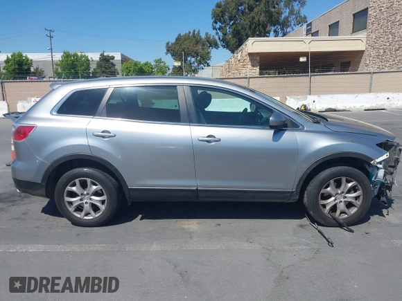 2011 Mazda CX-9 Sport with VIN JM3TB2BVXB0307360, listed as a IAAI auction lot 42580629 with 136,928 mi miles and . Bid and sale history available at DreamBid. Image 14.