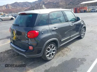 2014 FIAT 500L Trekking with VIN ZFBCFADHXEZ008730, listed as a IAAI auction lot 41454814 with 89,911 mi miles and . Bid and sale history available at DreamBid. Image 4.