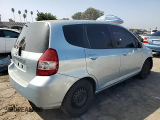 2007 Honda Fit with VIN JHMGD37477S055538, listed as a Copart auction lot 73222124 with 125,205 mi miles and Salvage Title. Bid and sale history available at carsss.com. Image 3.