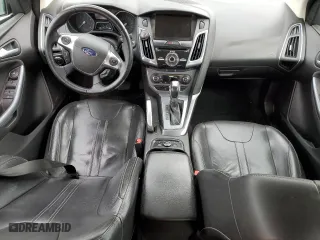 2012 Ford Focus Titanium with VIN 1FAHP3J21CL293447, listed as a Copart auction lot 43963615 with 151,448 mi miles and Salvage Title. Bid and sale history available at carsss.com. Image 8.