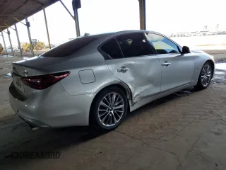 2018 Infiniti Q50 Luxe with VIN JN1EV7AP9JM358612, listed as a Copart auction lot 59427965 with 81,450 mi miles and Salvage title. Bid and sale history available at DreamBid. Image 3.