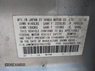 2007 Honda Accord LX SE z VIN JHMCM56327C023786, wystawiony jako IAAI lot #42465479 z przebiegiem 141 077 mil mil oraz . Historia ofert i sprzedaży dostępna na DreamBid. Obrazek 9.