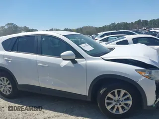 2013 Mazda CX-5 Touring with VIN JM3KE2CE0D0119032, listed as a IAAI auction lot 41891556 with 174,745 mi miles and . Bid and sale history available at carsss.com. Image 13.