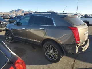 2014 Cadillac SRX z VIN 3GYFNAE34ES561414, wystawiony jako Copart lot #44760395 z przebiegiem 131 723 mil mil oraz Szkoda całkowita • Salvage title. Historia ofert i sprzedaży dostępna na DreamBid. Obrazek 2.