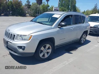 2011 Jeep Compass Latitude with VIN 1J4NF1FB6BD218694, listed as a IAAI auction lot 42192167 with 155,012 mi miles and . Bid and sale history available at DreamBid. Image 2.