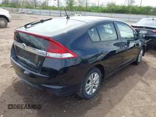 2014 Honda Insight EX z VIN JHMZE2H75ES001709, wystawiony jako IAAI lot #42086181 z przebiegiem 103 045 mil mil oraz . Historia ofert i sprzedaży dostępna na DreamBid. Obrazek 4.