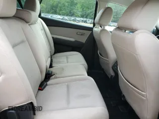 2015 Mazda CX-9 Sport z VIN JM3TB3BV0F0462219, wystawiony jako Copart lot #55605155 z przebiegiem 162 589 mil mil oraz Szkoda całkowita • Salvage title. Historia ofert i sprzedaży dostępna na DreamBid. Obrazek 11.