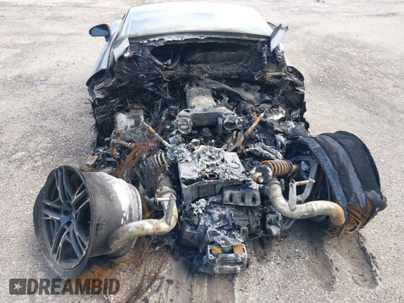 2021 Audi R8 z VIN WUAKBAFX5M7900468, wystawiony jako IAAI lot #41214857 z przebiegiem Nie podano mil oraz . Historia ofert i sprzedaży dostępna na DreamBid. Obrazek 11.