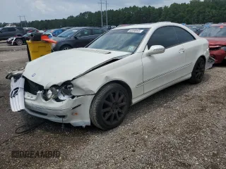 2007 Mercedes-Benz CLK 350 with VIN WDBTJ56H97F215371, listed as a Copart auction lot 63598595 with 104,116 mi miles and Salvage title. Bid and sale history available at DreamBid. Image 1.