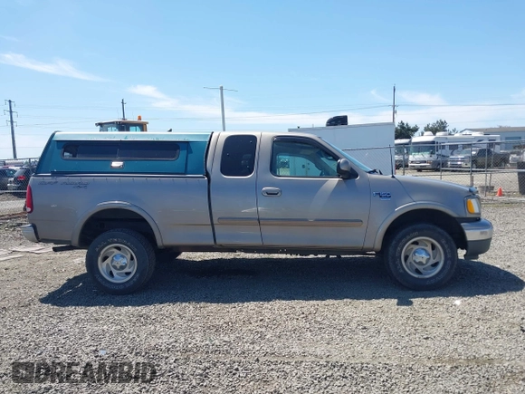 2001 Ford F-150 XL z VIN 2FTRX18L61CA78784, wystawiony jako IAAI lot #42228289 z przebiegiem 208 507 mil mil oraz . Historia ofert i sprzedaży dostępna na DreamBid. Obrazek 13.