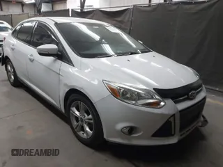 2014 Ford Focus SE with VIN 1FADP3F22EL437727, listed as a IAAI auction lot 42001593 with 90,814 mi miles. Bid and sale history available at carsss.com. Image 1.