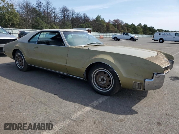1967 Oldsmobile Toronado with VIN 396877M621130, listed as a Copart auction lot 71016094 with 17,887 mi miles and Salvage Title. Bid and sale history available at DreamBid. Image 4.