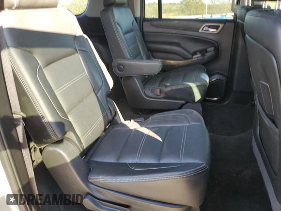 2016 GMC Yukon XL Denali with VIN 1GKS1HKJ9GR350005, listed as a Copart auction lot 76327064 with 94,556 mi miles and Salvage Title. Bid and sale history available at carsss.com. Image 12.