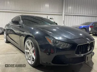 2014 Maserati Ghibli S Q4 z VIN ZAM57RTA9E1112724, wystawiony jako Copart lot #73739204 z przebiegiem 45 525 mil mil oraz Szkoda całkowita • Salvage title. Historia ofert i sprzedaży dostępna na DreamBid. Obrazek 1.
