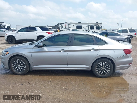 2021 Volkswagen Jetta S z VIN 3VWC57BU4MM094780, wystawiony jako IAAI lot #42103554 z przebiegiem 49 044 mil mil oraz . Historia ofert i sprzedaży dostępna na DreamBid. Obrazek 14.