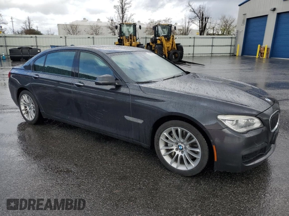 2015 BMW 7 Series 740Li with VIN WBAYE4C52FD947509, listed as a Copart auction lot 49269705 with 80,111 mi miles and Salvage Title. Bid and sale history available at DreamBid. Image 4.