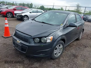 2014 Chevrolet Sonic LT with VIN 1G1JC5SH8E4235864, listed as a IAAI auction lot 42247217 with 150,057 mi miles and . Bid and sale history available at DreamBid. Image 2.
