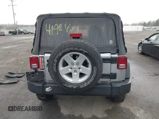 2015 Jeep Wrangler Sport with VIN 1C4AJWAG6FL501160, listed as a IAAI auction lot 41941661 with 134,842 mi miles. Bid and sale history available at carsss.com. Image 16.