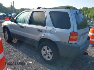 2006 Ford Escape XLT with VIN 1FMYU93156KD26045, listed as a IAAI auction lot 42503718 with 141,738 mi miles and . Bid and sale history available at DreamBid. Image 3.