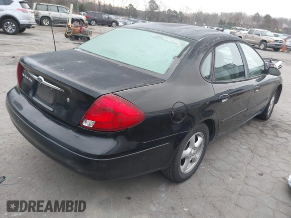 2000 Ford Taurus SE with VIN 1FAFP53U9YA252519, listed as a IAAI auction lot 41247046 with 317,910 mi miles and . Bid and sale history available at DreamBid. Image 4.