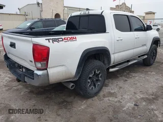 2016 Toyota Tacoma SR with VIN 5TFCZ5AN6GX006039, listed as a IAAI auction lot 41908239 with 222,939 mi miles and . Bid and sale history available at DreamBid. Image 4.