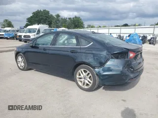 2014 Ford Fusion SE with VIN 3FA6P0HD4ER312252, listed as a Copart auction lot 52252565 with 118,967 mi miles and Salvage Title. Bid and sale history available at DreamBid. Image 2.