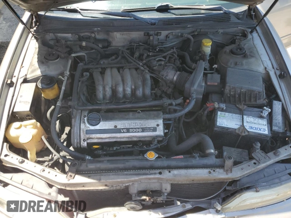 1998 Nissan Maxima GXE с VIN JN1CA21D0WT525657, выставлен на аукционе Copart как лот 57055485 с пробегом Не указан миль и Списание • Salvage title. История ставок и продаж доступна на DreamBid. Изображение 11.