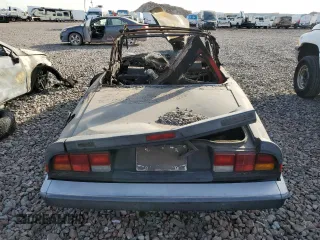 1988 Alfa Romeo Spider z VIN ZARBA5585J1058172, wystawiony jako Copart lot #79445664 z przebiegiem Nie podano mil oraz Nie do naprawy • Non repairable. Historia ofert i sprzedaży dostępna na DreamBid. Obrazek 6.