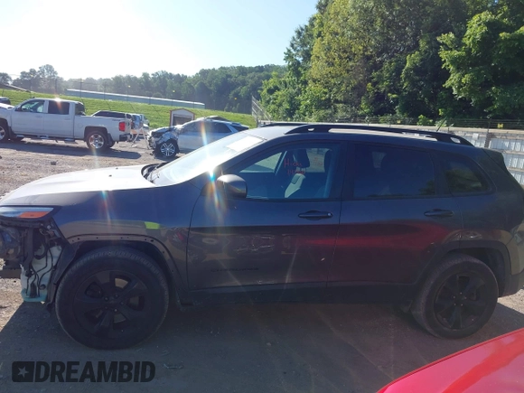 2018 Jeep Cherokee Latitude with VIN 1C4PJMCBXJD597667, listed as a IAAI auction lot 42486786 with 149,081 mi miles and . Bid and sale history available at DreamBid. Image 14.