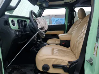 2018 Jeep Wrangler Unlimited Sahara z VIN 1C4HJXEN2JW211387, wystawiony jako Copart lot #42776935 z przebiegiem 66 170 mil mil oraz Szkoda całkowita • Salvage title. Historia ofert i sprzedaży dostępna na DreamBid. Obrazek 7.