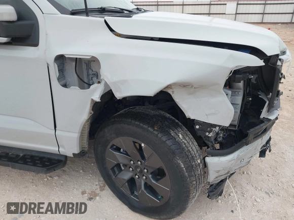 2023 Ford F-150 Lightning Pro z VIN 1FTVW1EL7PWG19070, wystawiony jako IAAI lot #41536193 z przebiegiem 22 654 mil mil oraz . Historia ofert i sprzedaży dostępna na DreamBid. Obrazek 23.