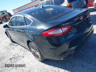 2016 Ford Fusion Titanium with VIN 3FA6P0K90GR179528, listed as a IAAI auction lot 41587248 with 230,264 mi miles and . Bid and sale history available at DreamBid. Image 3.