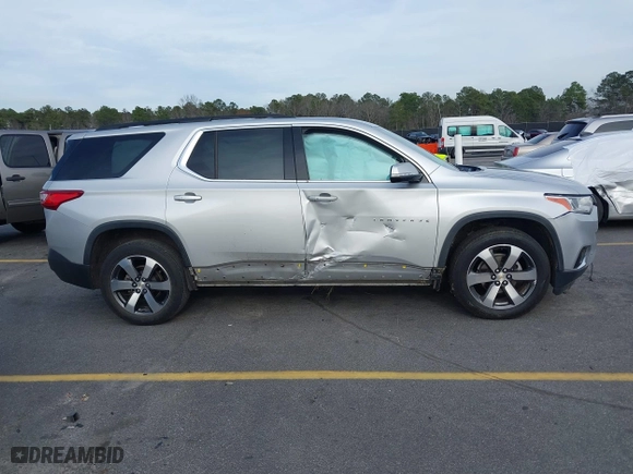2019 Chevrolet Traverse LT Leather with VIN 1GNERHKW6KJ140036, listed as a IAAI auction lot 41610615 with 98,685 mi miles. Bid and sale history available at carsss.com. Image 13.