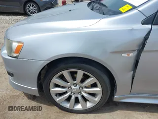 2008 Mitsubishi Lancer GTS with VIN JA3AU86U28U026507, listed as a IAAI auction lot 42033357 with 153,589 mi miles. Bid and sale history available at carsss.com. Image 6.