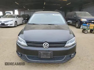 2011 Volkswagen Jetta SEL z VIN 3VWLX7AJ5BM370060, wystawiony jako Copart lot #50052585 z przebiegiem 157 629 mil mil oraz Szkoda całkowita • Salvage title. Historia ofert i sprzedaży dostępna na DreamBid. Obrazek 5.