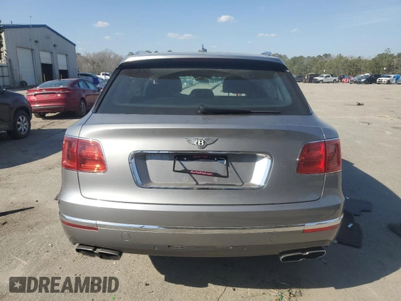 2019 Bentley Bentayga V8 z VIN SJAAM2ZV9KC024755, wystawiony jako Copart lot #46757605 z przebiegiem 26 951 mil mil oraz Szkoda całkowita • Salvage title. Historia ofert i sprzedaży dostępna na DreamBid. Obrazek 6.