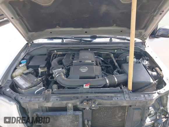 2013 Nissan Frontier SV with VIN 1N6AD0CUXDN763835, listed as a IAAI auction lot 42519926 with 208,577 mi miles and . Bid and sale history available at DreamBid. Image 10.