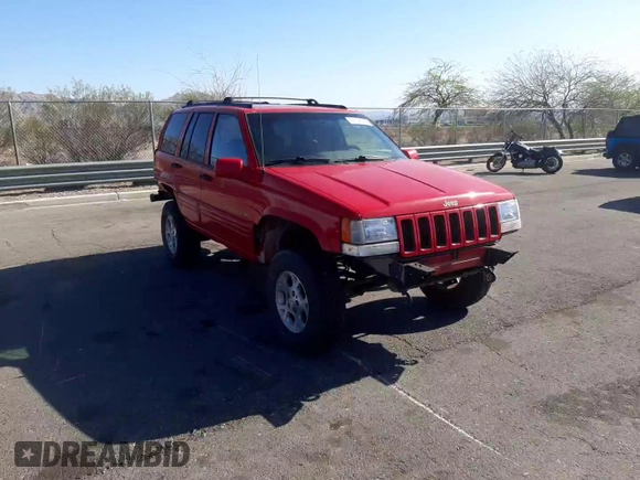 1996 Jeep Grand Cherokee Limited with VIN 1J4GZ78Y0TC376265, listed as a Copart auction lot 52124345 with 205,676 mi miles and Salvage Title. Bid and sale history available at carsss.com. Image 11.